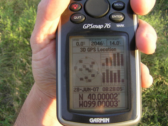 As I was walking away from the confluence, a rare sight:  Recording position from 12 GPS satellites!