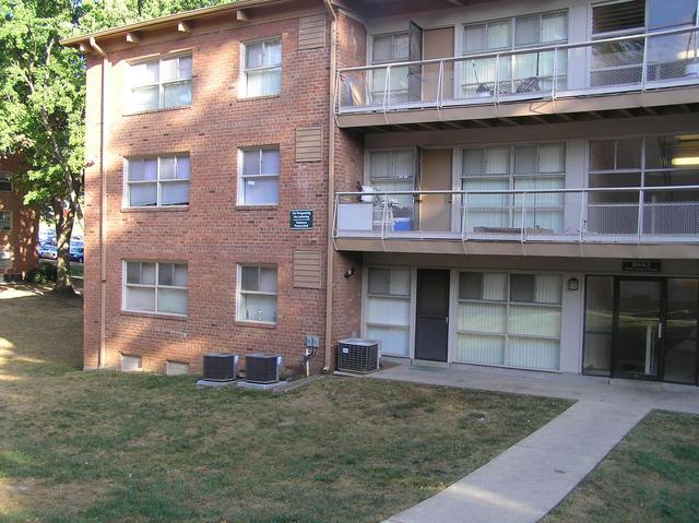 The confluence is in the lower left apartment in this building.