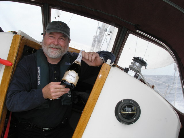 Captain Culver with champagne for celebratation