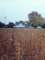 #3: The Mighty Red Confluence Explorer alongside M-21, and on the south side of the higway, another home