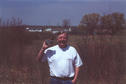 #2: Steve at the site with Betty's farm in the background