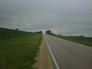 #1: Looking west along County Road 115