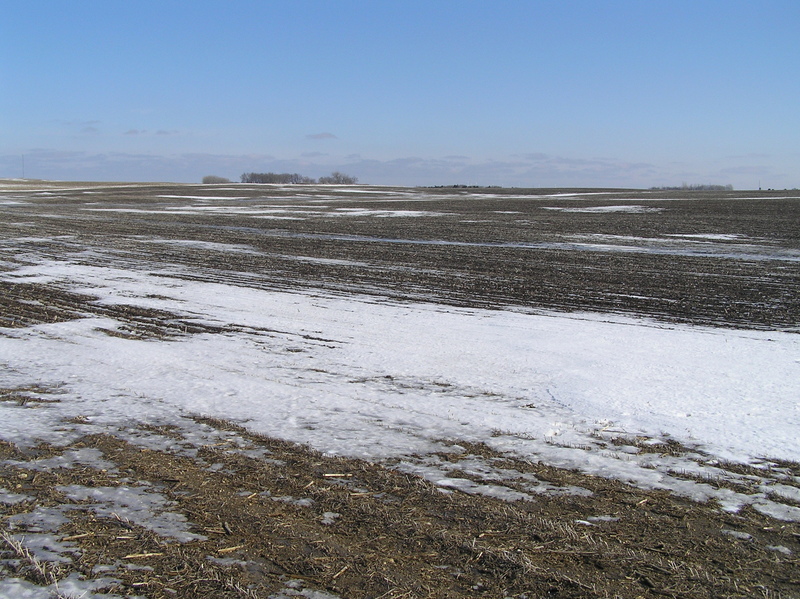 The confluence lies just to the far side of the patch of snow, looking southeast.