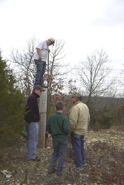 Climbing over the elk fence