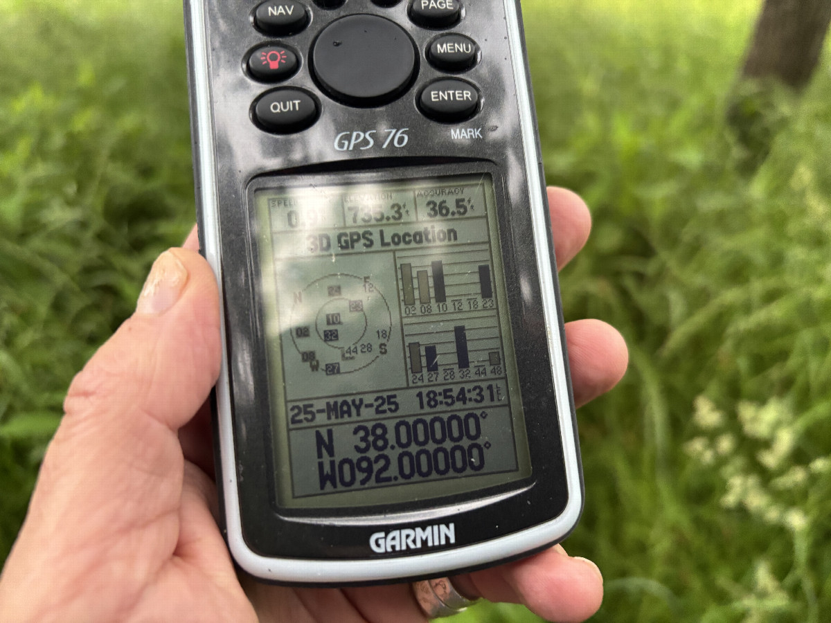 GPS receiver at the confluence point.