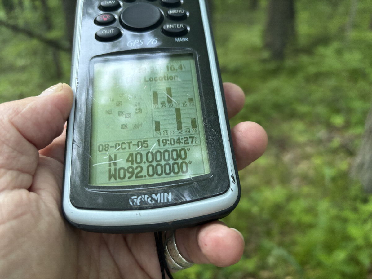 GPS receiver at the confluence point. 