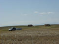 #6: Looking west from higher ground about 20 meters away. Rocky Mountains appear faintly in the background. Van and trailer survived the off-road adventure.