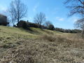 #5: Looking west, note clear blue sky with only a hint of wispy clouds