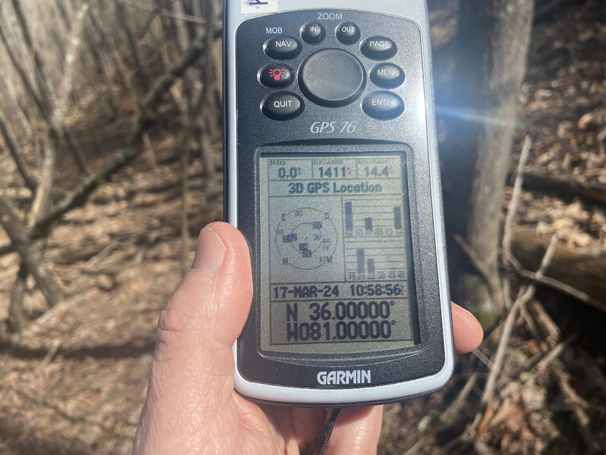 GPS receiver at the confluence point. 