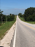 #6: Looking west on Nebraska Route 66 in front of the house.