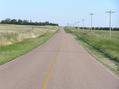 #9: View to the south along north-south road about 200 meters west of the confluence.