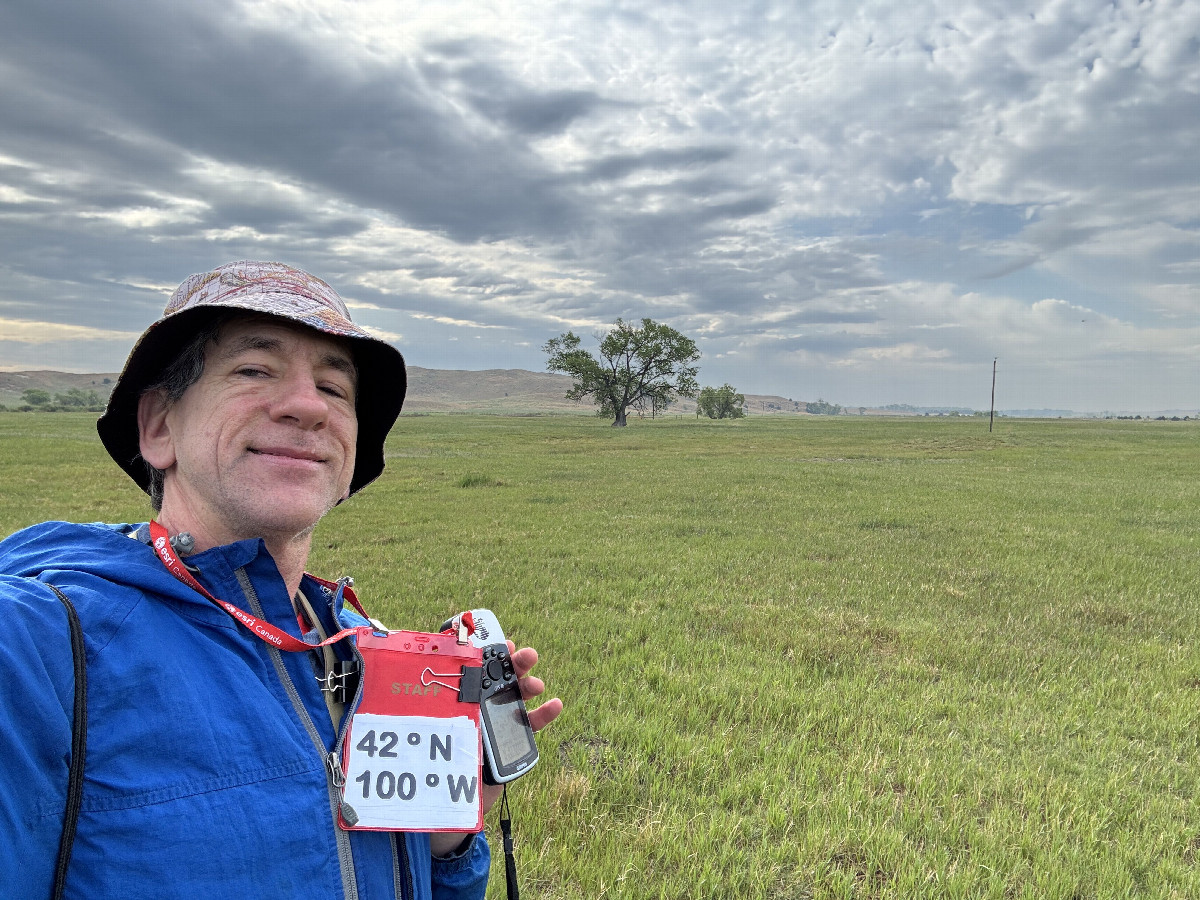 Joseph Kerski at the confluence point. 
