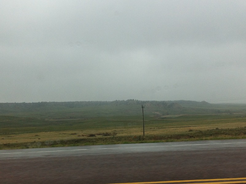 Another view toward the confluence in the rain, with snow beginning to fall, despite the fact that it was now May.