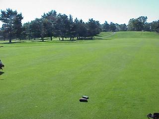 #1: Confluence site (at spot where GPS receiver sits) and part of the fourth fairway at Riverton Country Club, looking southeast.