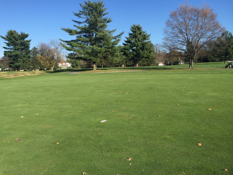 The confluence of 40 North 75 West, in foreground, near marker on the fairway, looking northeast.