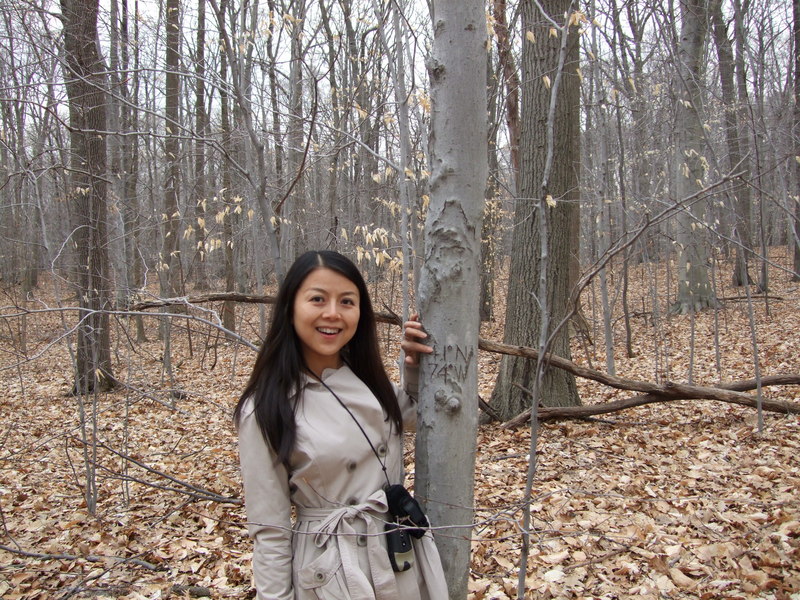 Jadelynne near the carved tree (no, *we* didn't vandalize it)