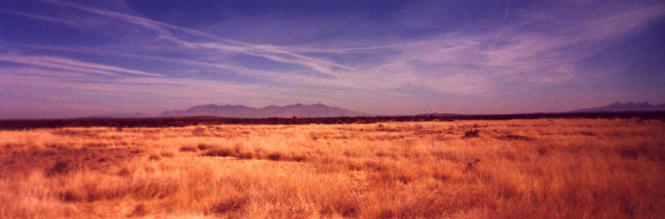 Looking east.  On the left: Florida Mtns, on the right: Tres Hermanas (3 sisters)