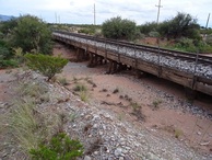 #7: Railway bridge spanning the arroyo and Riata road in the background