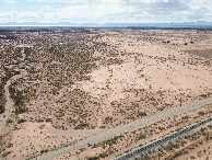 #11: View West, from 120m above the point