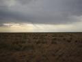 #4: Looking west towards a windmill and approaching rainstorms