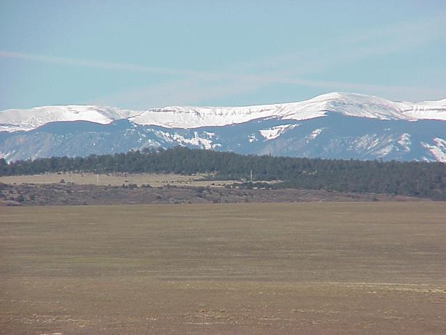 View from the confluence to the west and the Sangre de Cristo Mountains.
