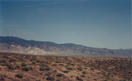 #6: Looking south from the top of the hill east of the point at the Paradise Range with Gabbs, NV, visible at the mountain base on the right.