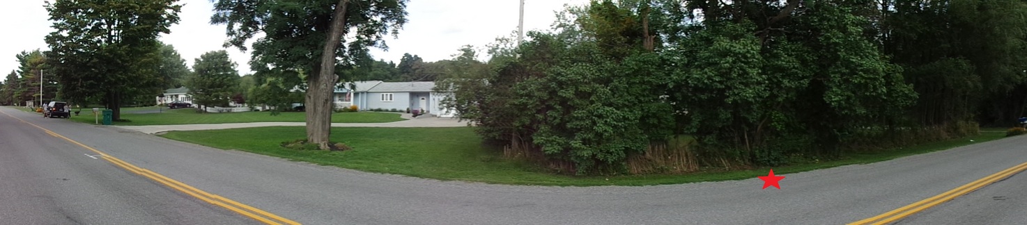 Panoramic view from the west side of the road. CP is marked by the red star.