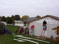 #2: House to the north of the confluence receiving new siding.