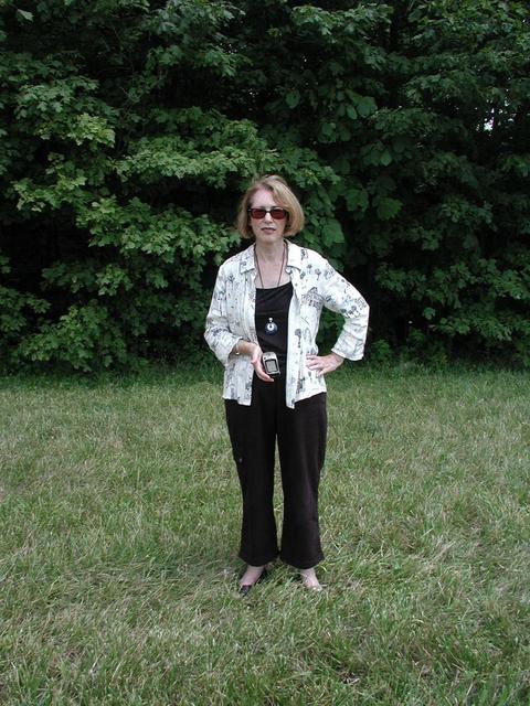 View East. Jackie near confluence point (in the woods behind her).