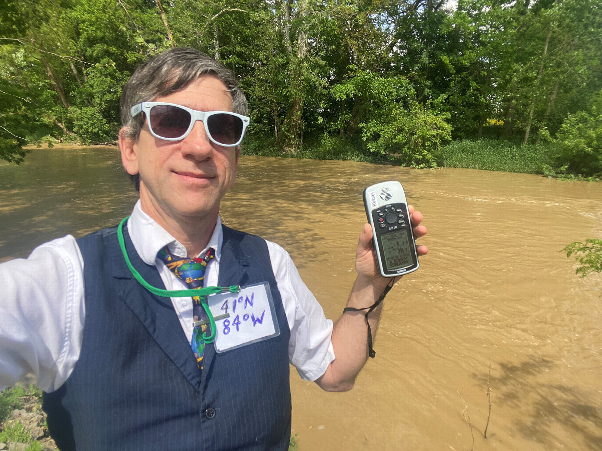 Joseph Kerski at the confluence point. 