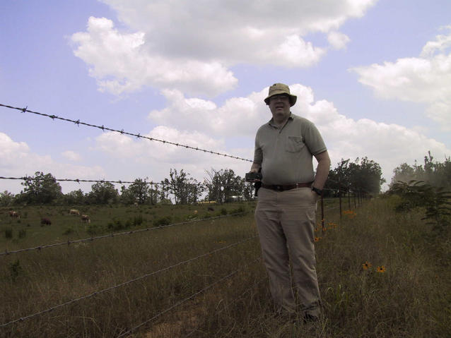 About 8 meters west of the confluence (confluence hunter needs to lose about 60lbs!)