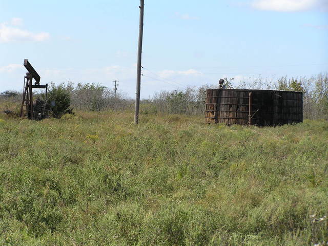 View of oil facilities to the west southwest.