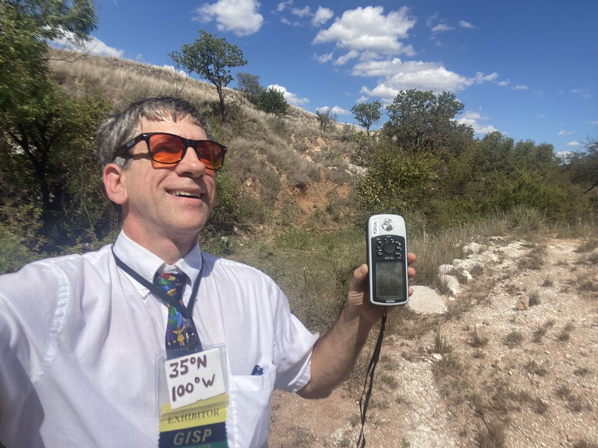 Geographer Joseph Kerski at the confluence point. 