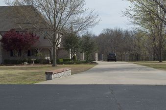 #1: The confluence point lies 232 feet away, in the back yard of this home.  (This is also a view to the South.)