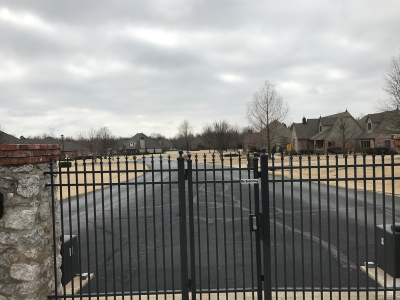 Gate at entrance to the housing subdivision containing 36 North 96 West.