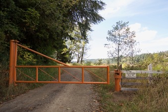 #1: This gate - 0.27 miles from the point - was present during my last visit, 12 years ago, but it's now signed "No Trespassing"