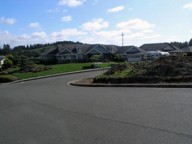 The confluence is behind the house