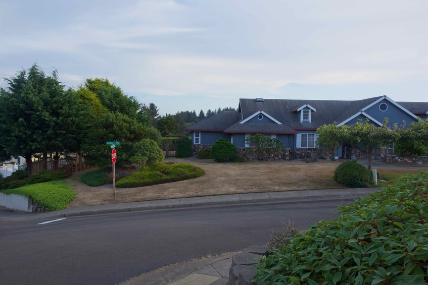 The confluence point lies in the back yard of this house