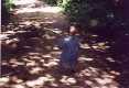 #5: Yona runs down the logging road on our way to the confluence.