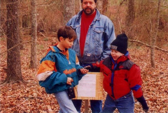 Wes, Marty and Taylor with sign