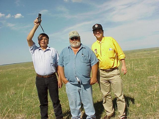 Ben Black Bear and John Whiting (Lakota Sioux Tribal Government) and Joseph Kerski (USGS Geographer) at the confluence.