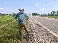 #3: Looking east from 44°N 103°W (photobombed by a semi-retired confluence hunter).