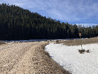 #2: Looking south down Boles Canyon Road, about 6.5 mi/10.5 km from 44N 104W