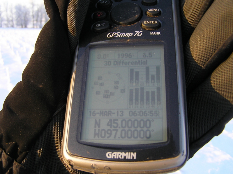 Gloved but frozen fingers:  Holding GPS receiver at 45 North 97 West.