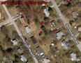 #10: Consulting the Google Earth © aerial photography prior to this attempt would have greatly simplified the visit! [The star indicates the “ten zero” spot in the backyard of 5816 Wilkerson.  The red circles mark the photographer’s loca