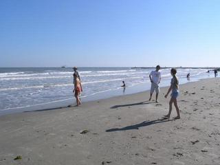 #1: Playing on the beach, looking towards the point