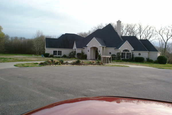 House with confluence in back yard