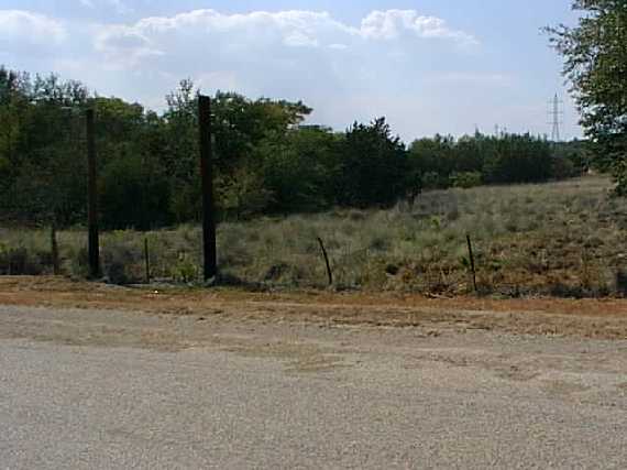 The confluence is through those trees (bushes??)