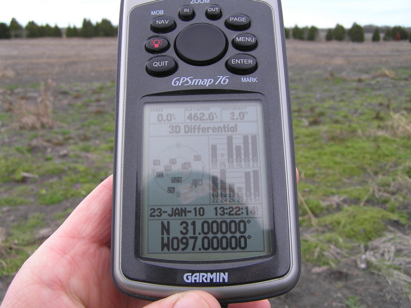 GPS reading at the confluence point under a big Texas sky.