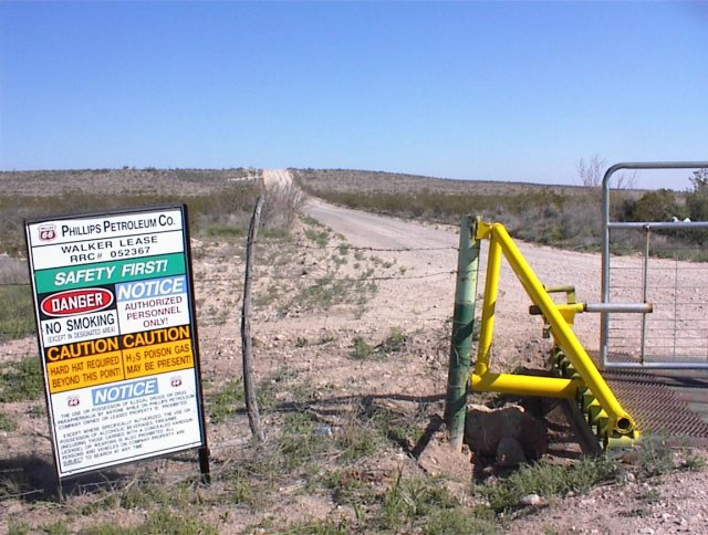 Looking towards confluence point 2 miles away at oilfield gate